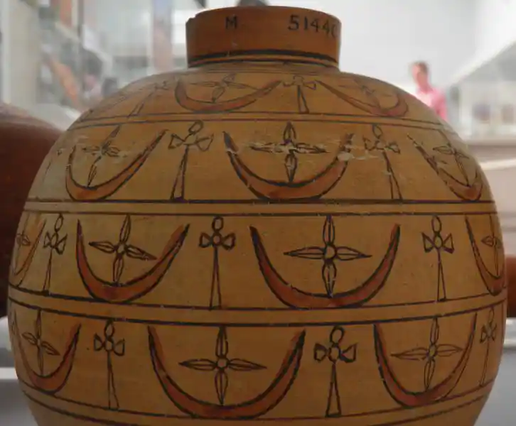 Cross on a crescent on a globular vase